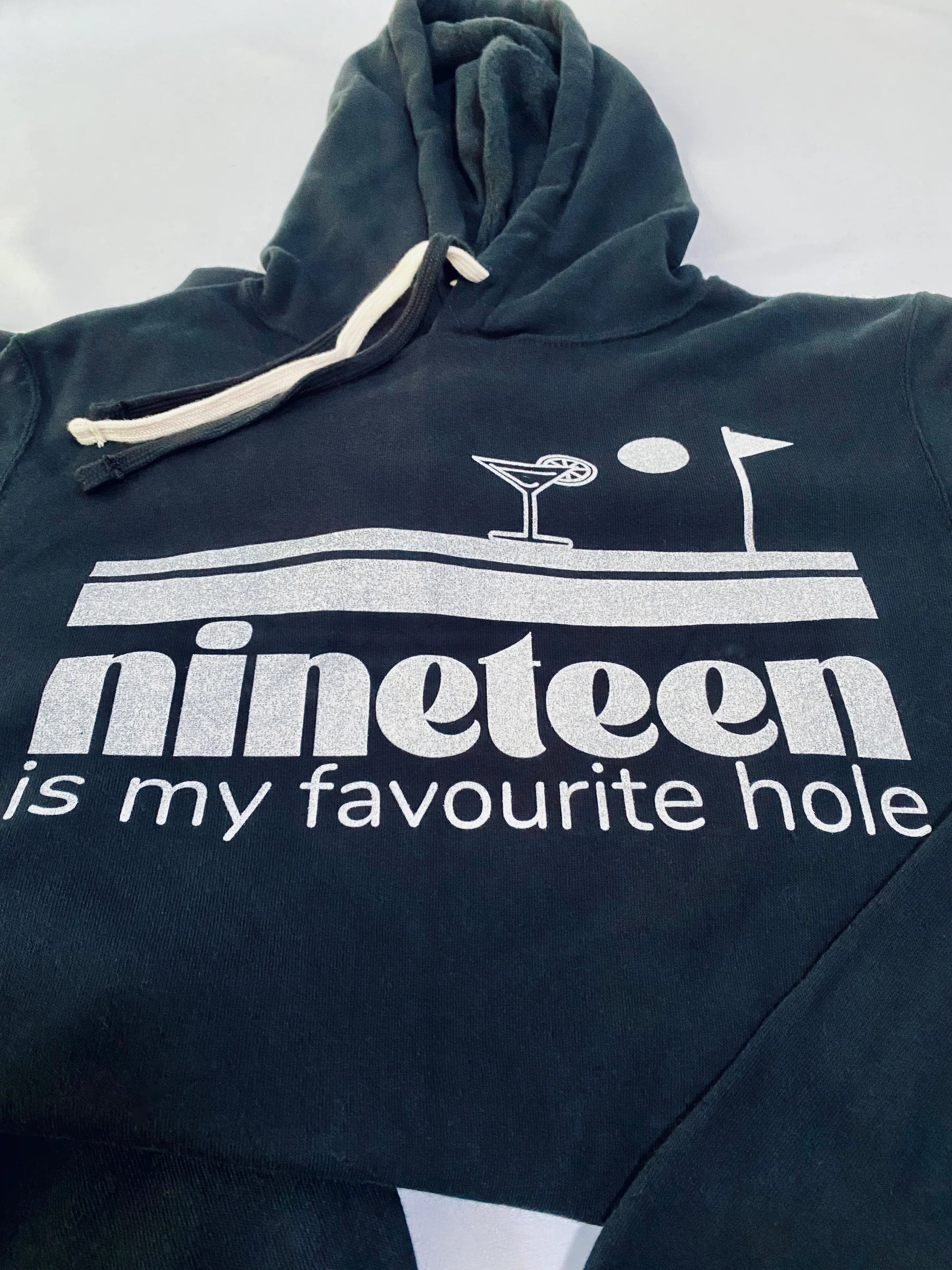 Close-up of the Nineteenth hole sweatshirt dress by Golf Garter.